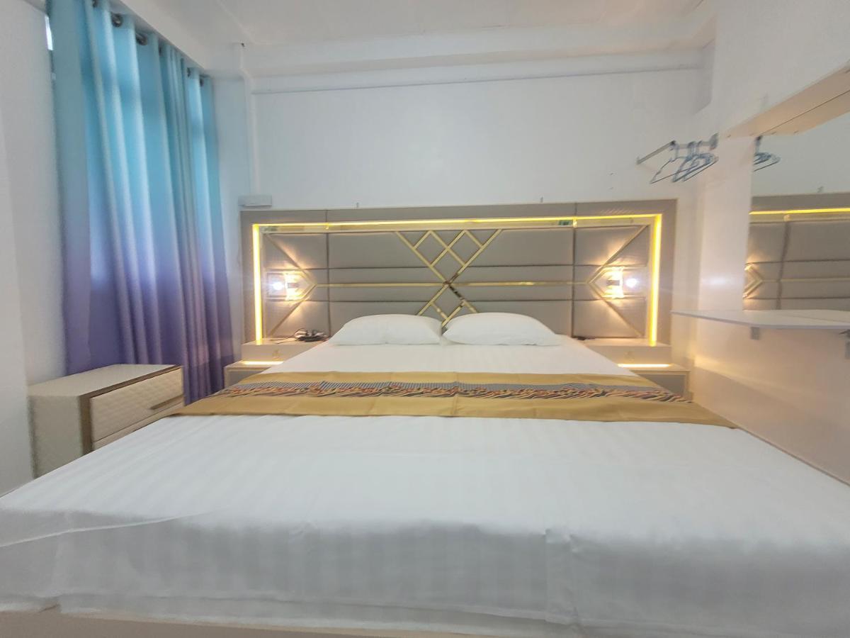 Ontrack Travel Apartment Male Ngoại thất bức ảnh